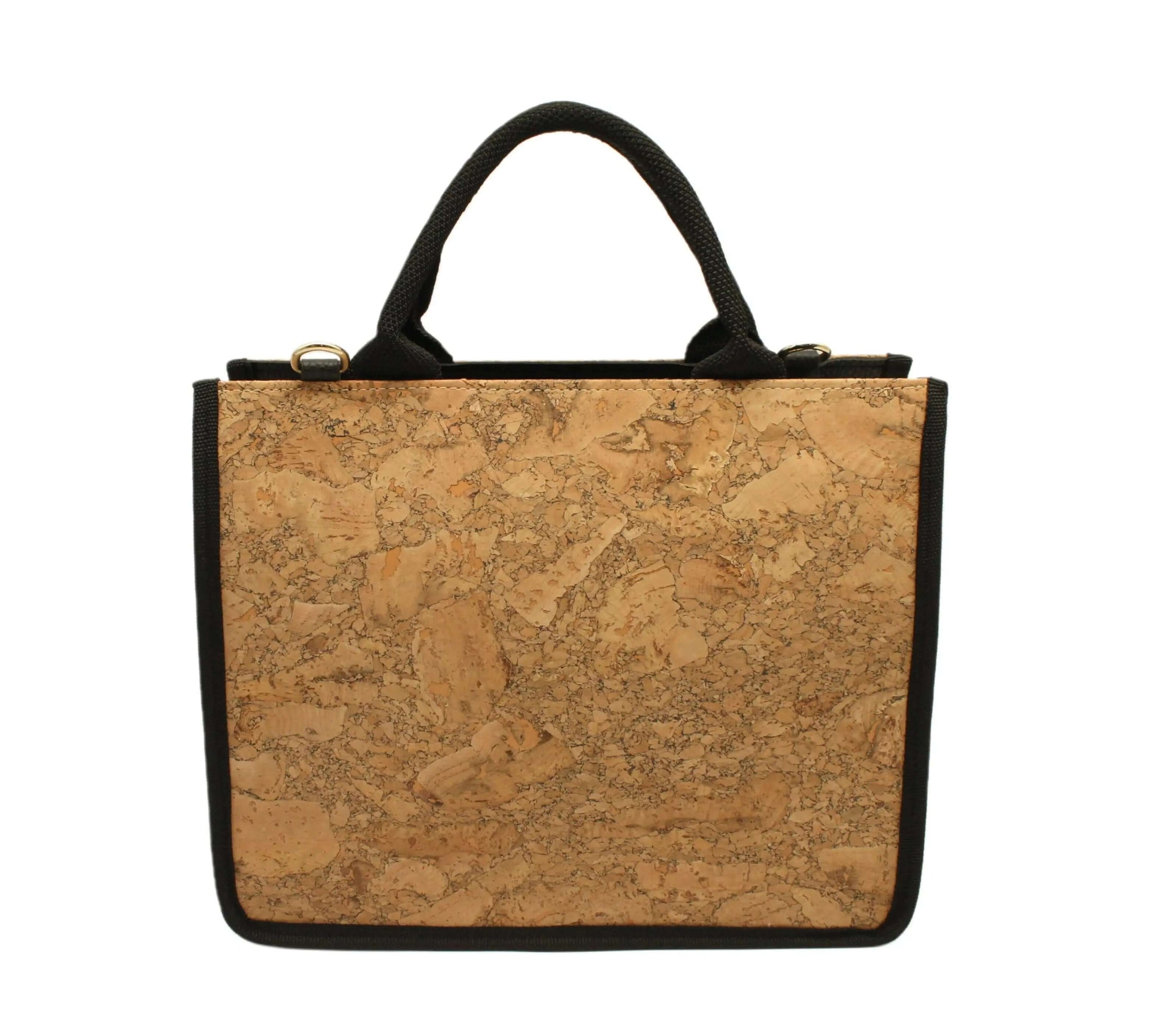 Stylish cork handbag with a black handle, perfect for eco-friendly fashion. Dimensions: 31 x 25 x 11 cm.